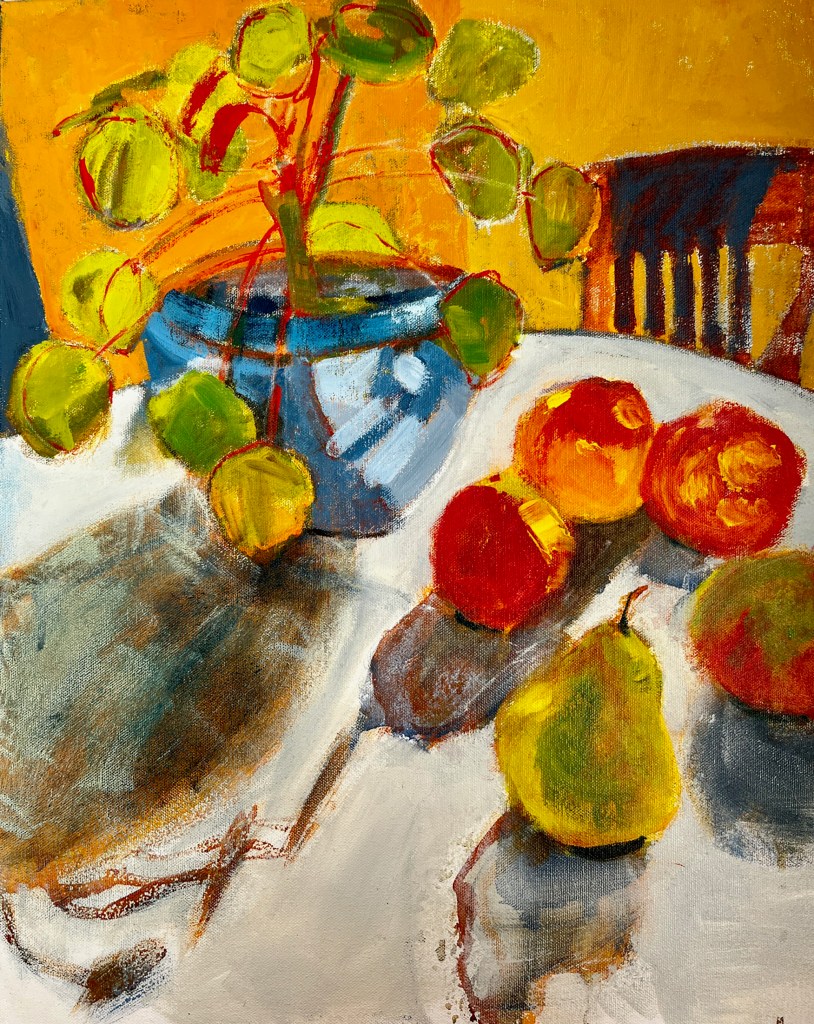 Painting of a still life on a table with a plant, four apples and a pear and a chair 