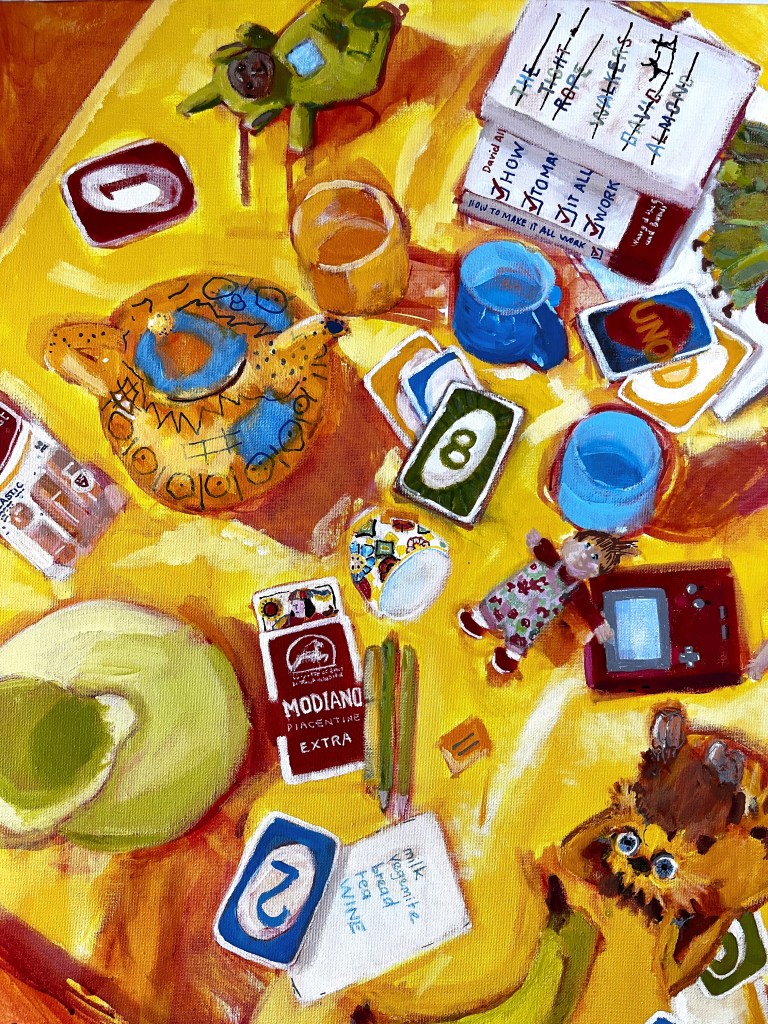 Still life painting with teapot, jug, cups, cards, toys 