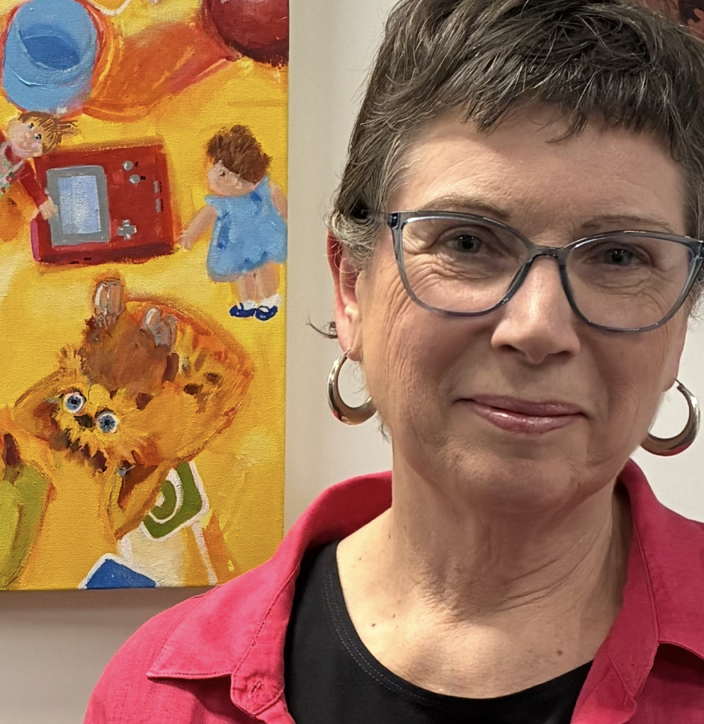 artist Louise Terranova in front The Tightrope Walker 